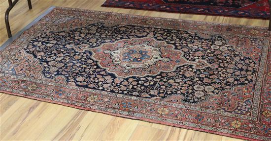 A Bokhara red ground rug and another 210 x 132cm